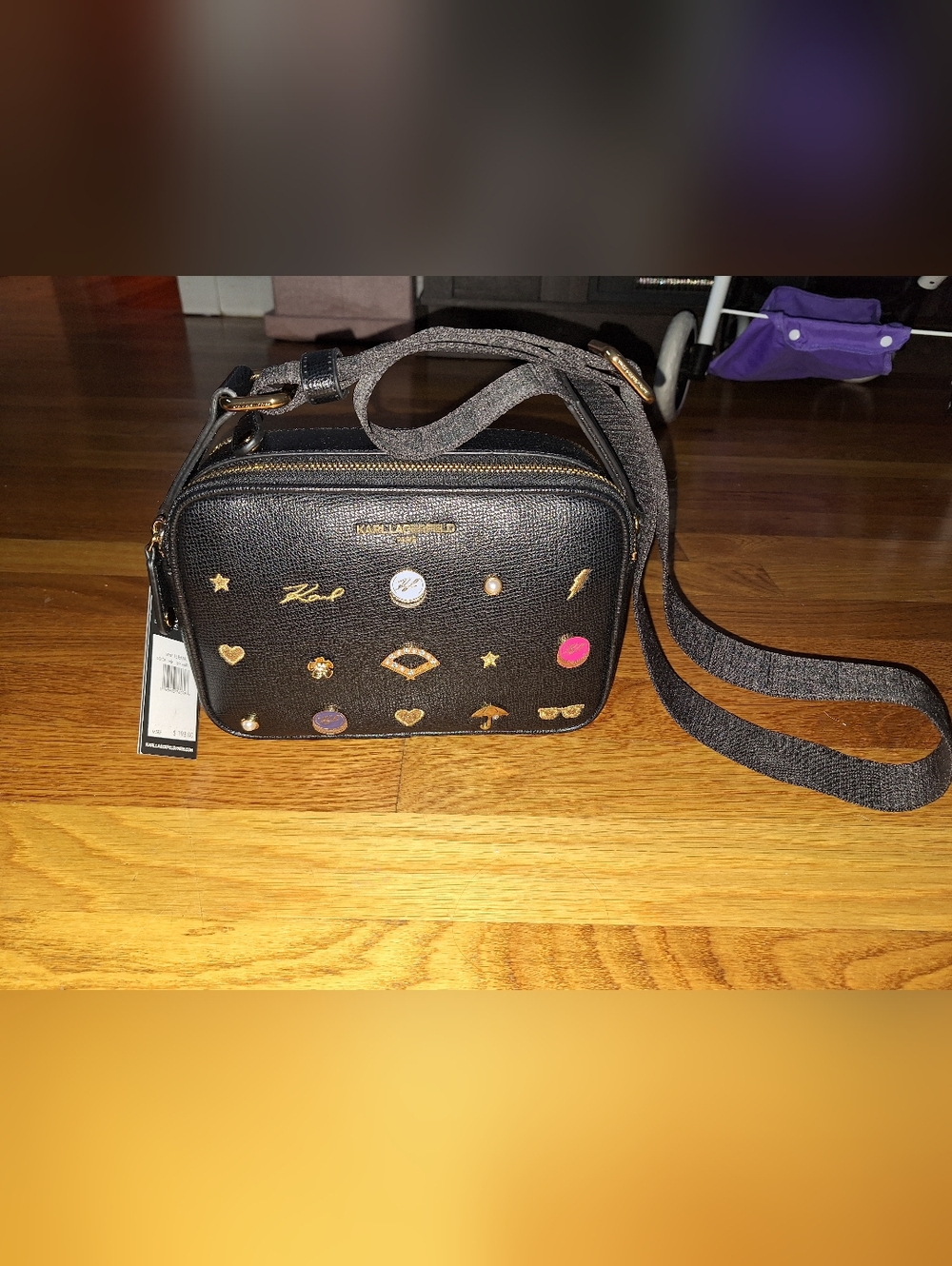 Karl Lagerfeld Black Crossbody with Gold Charm Detailing and Pink Accent